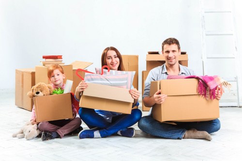 Packed moving boxes and furniture ready for relocation