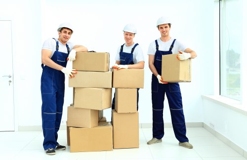 Relocation team moving office equipment in South London