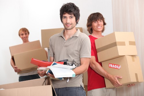 Packed boxes and household items ready for a local home relocation