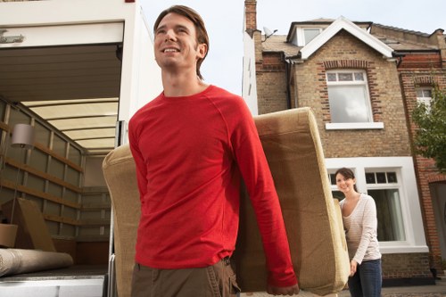 Loading furniture and boxes into a van for a removal job in Elephant and Castle