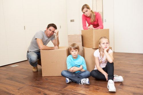 Packed office equipment and furniture ready for a business move