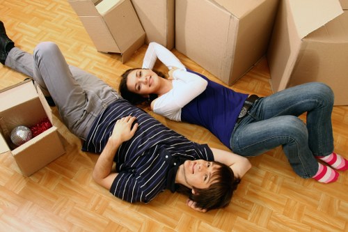 Management and workers reviewing health and safety procedures for removals